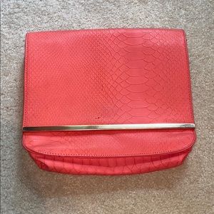 CHARMING CHARLIE coral clutch